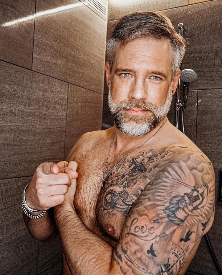 Results from Planet Fitness' fifth annual survey reveals how Americans feel about the body type that's defined the art of fatherhood for five straight years. Of course, "daddy" in the gay community and "daddy" on Main Street USA may mean different things to different people, but that's not stopping us from celebrating daddies in all their glory. In 2017, the inaugural "dad bod" study uncovered that 64% of men with dad bods were comfortable and confident in their own skin. Today, those same figures continue to climb, with 69% of men with dad bods noting they are confident and comfortable with their physique, and 52% of men proclaiming they are (still) attracted to men with the body type. But, despite a growing affinity for the body type, half of all men with dad bods (50%) feel judged by others for their bodies — a number that's jumped 10% since just last year alone. Tap link in bio to see some of our favorite #dadbods on @EDGEmedianetwork ???? (?: Michael Walter / @scooby75)