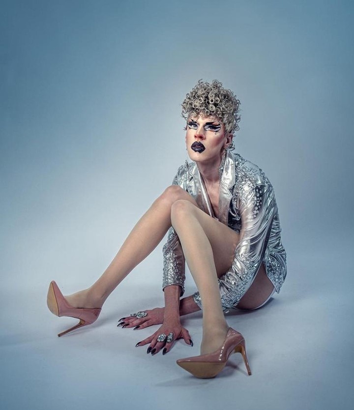 "RuPaul's Drag Race" found its Season 13 villain on Friday night (if only for one episode) in the person of Utica Queen, the Minnesota-based drag queen who idiosyncratic personality defied being categorized up to last week's episode. The lanky queen, whose wide smile and broad style brought to mind a hippie version of Carol Burnett, had stayed afloat in the competition thanks to his shrewd fashion sense and by simply defying being categorized. But what did him in on this week's episode was his seeming just mean in this week's challenge, a "Nice Girls Roast" that included contestants Nina West, Valentina and Heidi N Closet. By their nature roasts push the boundaries of taste, but Utica took it to a new level as she ignored the suggestions by judges Michelle Visage and Loni Love to bring down the meanness with his roast jokes. Instead Utica ratcheted them up, resulting in one of the most uncomfortable sequences on the show this season. After being sent home, she seemed oblivious to criticism, but tweeted an apology after the episode aired on Friday for her size-shaming jokes. "I want to apologize for my performance in this ep of DR. Especially to @ LoniLove, @ michellevisage, and @ NinaWest, the jokes were in bad taste and my attempt at roast humor was for the lack of better words, horrible. Making fun of people's size is not okay. I'm truly sorry." Tap link in bio to continue on @EDGEmedianetwork ?? (?: Utica / Instagram / @queenutica, ?: @trevorbeatyphoto, Suit Stoning/Nails: @nessie.nails , Makeup inspired by @thearseniek )