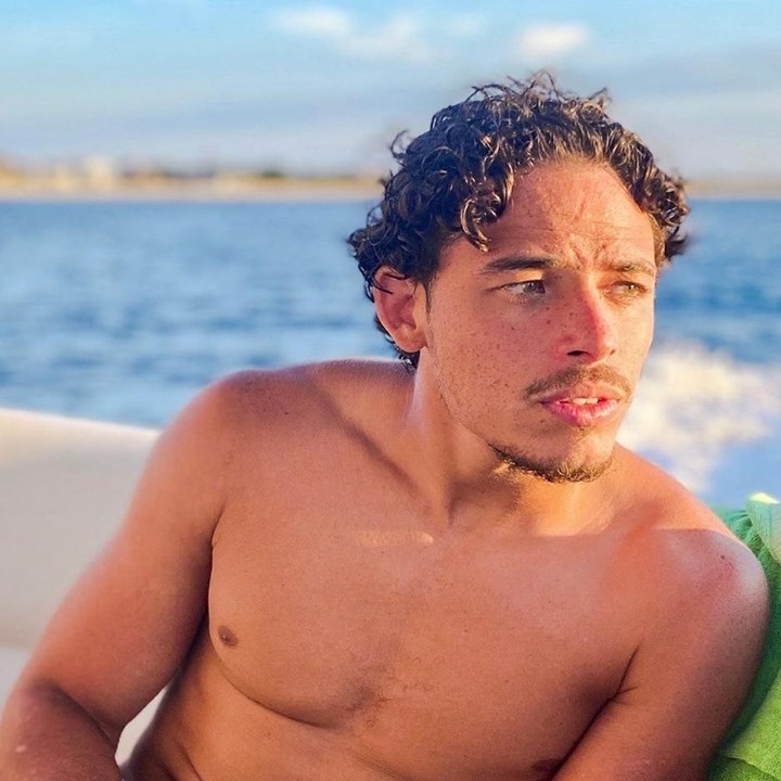 Anthony Ramos shared a sweet vid of himself doing sit-ups with a little help from his dog Prince as his film "In the Heights" begins to make its way to theaters in June. Ramos is already having quite a good year. In February he was named to the TIME 100, the magazine's list of influencers to watch over the year. Earlier this month, the "Hamilton" actor was part of a group of entertainment influencers included in a new Calvin Klein underwear campaign. Now this weekend Warner Brothers is teasing a series of posters for Ramos's upcoming film "In The Heights," in which he plays the lead in John M. Chu's adaptation of Lin-Manuel Miranda's Broadway musical. The film will be released in June in theaters and on HBO Max. "Six posters surfaced on the film's official Twitter account on Saturday morning, each with a different design, though featuring the same tagline, 'The Time Has Come.'" reported The Hollywood Reporter. The playful actor recently shared a thirst-trapping video of himself doing sit-ups with a little help from his dog Prince. In the musical, Ramos plays a bodega owner struggling to make a better life for himself in Washington Heights and dreams of moving to the Dominican Republic. The role was played on Broadway in 2008 by Miranda where the musical ran for three years. Previously Ramos was featured in the 2012 national tour of the musical prior to originating two roles in Miranda's megahit "Hamilton" as part of the original cast. He also had a featured role in Bradley Cooper's 2018 adaptation of "A Star is Born" where he played Lady Gaga's BFF Ramon. In 2019 Ramos released his first CD for Republic Records "The Good & The Bad." Tap link in bio to continue on @EDGEmedianetwork ??? (?: Anthony Ramos / Instagram / @anthonyramosofficial)
