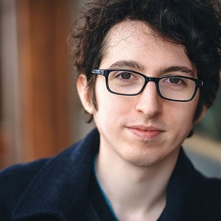 A Manhattan City Council candidate got some unexpected attention last week, and wished he hadn't. "Zack Weiner, 26, a city council candidate running in Manhattan, has found his campaign tied up after video of him enjoying a sadomasochism session found its way onto Twitter," reports the New York Post. "My magnificent domme friend played with Upper West Side city council candidate Zack Weiner, and I'm the only one who has the footage," reads a tweet from the anonymous account which posted the video last week. The footage shows Weiner gagged and being consensually abused by a leather-bound woman who pours hot wax on him and clips his nipples with clothespins. The footage was filmed at Parthenon studio in Midtown — which is known for its high-quality BDSM dungeons, the Post reports. In a call with The Post, Weiner confirmed it was him in the video and said the footage was made about 18 months ago with a former girlfriend he met during a Halloween party in 2019. "I didn't want anyone to see that, but here we are. I am not ashamed of the private video circulating of me on Twitter. This was a recreational activity that I did with my friend at the time, for fun. Like many young people, I have grown into a world where some of our most private moments have been documented online," Weiner said in a statement. "I am a proud BDSMer. I like BDSM activity," Weiner told The Post. He refused to name the woman in the video and said he had no idea how on earth the footage surfaced. "It's definitely a violation of trust," he added. Tap link in bio to continue on @EDGEmedianetwork ⛓️? (?: Zack Weiner / Website)