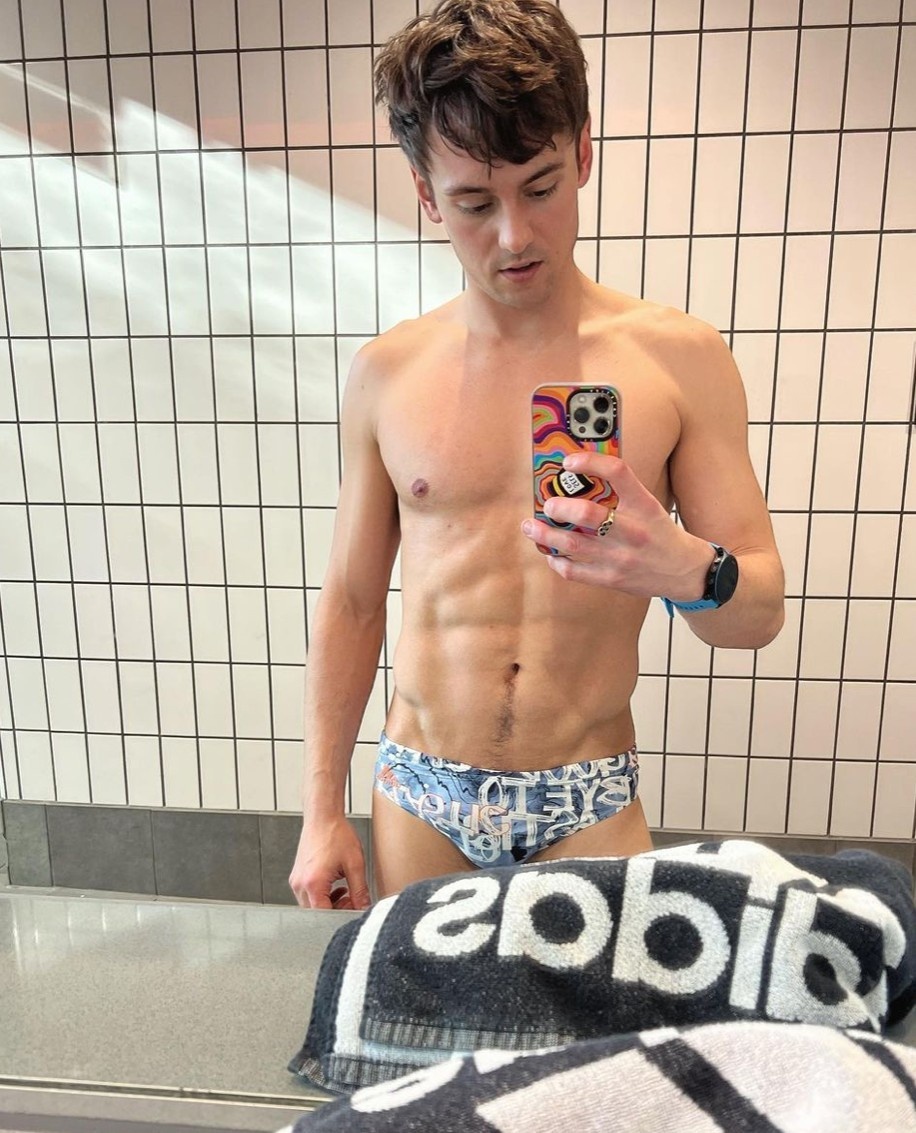 Olympic diver Tom Daley says he has always wanted to be a father, and now he is opening up about how it's going with screenwriter husband Dustin Lance Black in a new candid interview. Speaking to Radio Times, Daley said he had baby fever early on in his relationship with Black. "Back in 2013 we'd named our children, which seems to break every one of the dating rules!" said Daley. In 2018, the couple welcomed son Robbie Ray via surrogacy. Robbie is named after Daley's father Robert, who passed away at the age of 40 in 2011. "And I do feel I'm similar to how my dad was with me," said Daley. "Whether I was doing well or not, my parents were always there for me. It's just about being there to support Robbie on the good days, the bad days and everything in between." When it comes to parenting styles, Daley admits that he is the more disciplinary of the couple. "Yes. I'm Pappa and Lance is Daddy," Daley says, "and when I say no to Robbie he immediately goes to Lance and says, 'Daddy, Pappa says no, but can I?' And Lance says yes." And Robbie can be a handful, Daley says. "He loves to find things and jump off them and scare the living daylights out of me," he said. "But then Lance says, 'Well, what do you expect? You climb up things and jump off things for a living.'" Sounds like the couple has another Olympic diver in the making.⁠
⁠
Tap link in bio to continue on @EDGEmedianetwork⁠
????️‍??‍?‍?⁠
?️: Emell D. Adolphus / @goodnightdetroit ⁠
?: @tomdaley