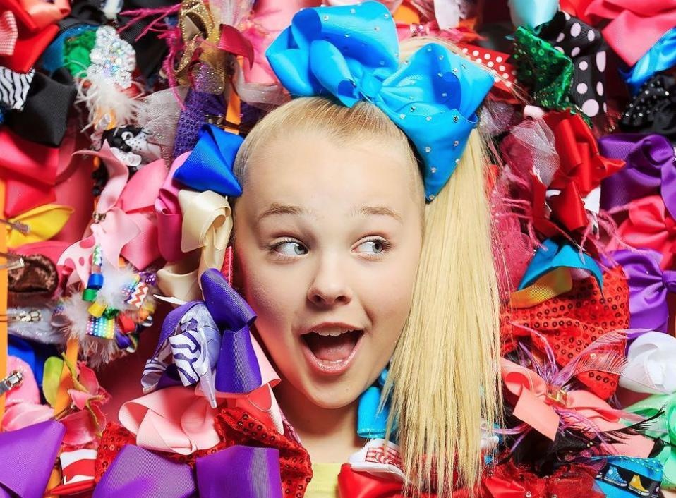 Pop star JoJo Siwa will compete as part of the first same-sex pairing on "Dancing With the Stars" for the show's upcoming 30th season. Siwa, an 18-year-old who has said she identifies as gay and queer, said the same-sex pairing signals to viewers that it's OK to be your true self. She named Lindsay Arnold, Jenna Johnson and Britt Stewart as among the show's regular pros she'd like to be paired with. "I think it breaks a wall that's never been broken down before," she told an online gathering of the Television Critics Association. "It's normal for a girl to dance with a guy, and I think that's really cool, but it's really special that now not only do I get to share with the world that you get to love who you love, but also you get to dance with who you want to dance with." Siwa noted that among the things to be worked out with her partner are who leads, how do they dress and what shoes do they wear. "It's going to give so much to people out there, people of the LGBTQ community, everyone, people who feel just a little different," she said. "I want to make it OK for the people who come after me." Tap link in bio to continue on @EDGEmedianetwork ?️‍?❤️?? (?: JoJo Siwa / Instagram / @itsjojosiwa)