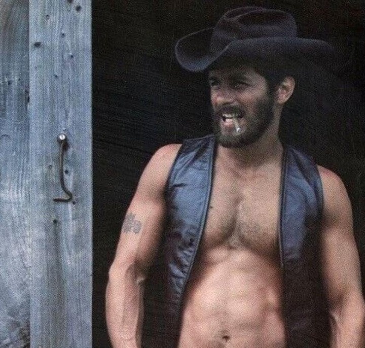 Thanks to the French website TÊTU for locating an Instagram account that brings new life to erotic gay images from the past, specifically archival pics from the 1970s and 1980s. The account is under the name of @truckstop_guy who, TÊTU writes: "With a fairly regular frequency, the owner of this page compiles screenshots from old pornographic VHS as well as photos from retro homoerotic magazines. The general watchword is above all to honor a facet of Western gay history by carrying out colossal archiving work." TÊTU tracked down BJ, who created the page, to talk about his posts and his process. "They belong to a riskier time when identifying clearly and proudly as gay, in a sexual way moreover, was revolutionary, underlines the sixty-year-old. Not that things are perfect today, but these men took a risk and helped young people like me to accept their sexuality but also to be totally satisfied with it." But BJ does more than just post the pics. He researches each one "to be as complete as possible on the models presented, on the studios, on the context ...," TÊTU adds. "At a time when the exchange of nudes has become commonplace, BJ wants to cherish these visuals which represented a true counter-current for the 80s." The photos include a Who's-Who of adult male performers from the time, including JD Slater, Al Parker, Bruno, Paul Gerrior, Mike Morris, Jack Wrangler, Bull Dozier amongst the hundreds of annotated posts from studios such as Colt, Falcon, Target, and Brentwood, plus such magazines as Mandate, Honcho, Playguy and Drummer. Dressed as construction workers, cops, and fireman with big hair, mustaches and plenty of body hair, these pics are definitely from the time before the Internet. But a few of the bearded looks could easily be from our digitized world. Tap link in bio to continue on @EDGEmedianetwork ??? (?: @truckstop_guy / Instagram)