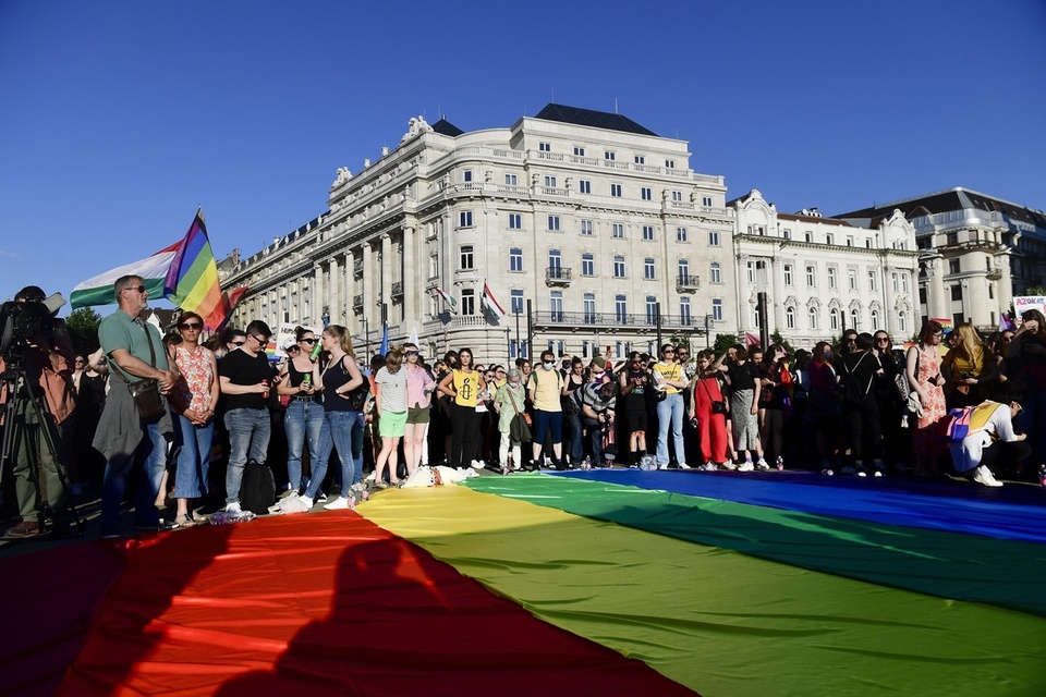 Lawmakers in Hungary passed legislation Tuesday that prohibits sharing with minors any content portraying homosexuality or sex reassignment, something supporters said would help fight pedophilia but which human rights groups denounced as anti-LGBT discrimination. The conservative ruling party of Hungarian Prime Minister Viktor Orban introduced the legislation, which is the latest effort to curtail the rights of gay men, lesbians, bisexual and transgender people in the central European nation. Hungary's National Assembly passed the bill on a 157-1 vote. The ruling Fidesz party has a parliamentary majority, and lawmakers from the right-wing Jobbik party also endorsed the measure. One independent lawmaker voted against it. All other opposition parties boycotted the voting session in protest. Human rights groups had denounced the measure strongly, seeing it as a tool that could be used to stigmatize and harass residents because of their sexual orientations and gender identities. Some human rights officials have compared it to the so-called gay "propaganda" law passed by Russia in 2013 which human rights officials say has become a tool to harass sexual minorities. "On this shameful day, the opposition's place is not in the parliament but on the streets," Budapest Mayor Karacsony wrote on Facebook. Tap link in bio to continue on @EDGEmedianetwork ?️‍???? (?: People unfurl a rainbow flag during an LGBT rights demonstration in front of the Hungarian Parliament building in Budapest, Hungary / Szilard Koszticsak / MTI via AP)