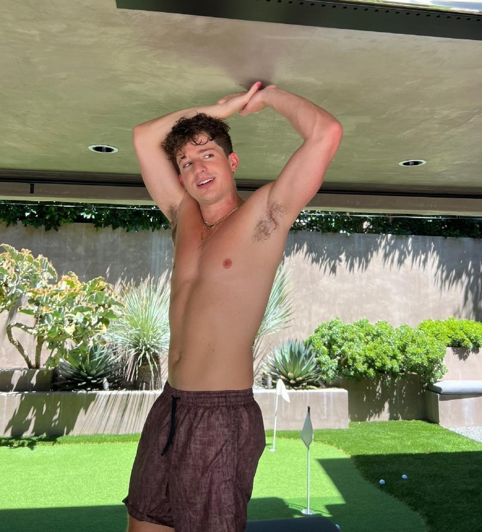 #EDGERewind :: Charlie Puth has a reputation for his thirsty social media posts and he lived up to that rep with a pair of sizzling snaps he posted this week. First came a Sept. 6 tweet featuring "an intimate selfie where all he's wearing is underwear and a headband," Uproxx reported. "It's quite revealing, and immediately went very viral, as he probably expected." He followed up the smoking selfie the next day with a stunning shot of himself on a swing, his bare backside to the lens, in a post reminding fans of the upcoming start of his new tour. "What rhymes with Four??" Puth teased. "Find out friday lol" The post had the effect of "prompting followers to assume he is announcing a tour in conjunction with the release of his forthcoming album, 'Charlie,'" Page Six reported. Uproxx noted that Puth "has been previewing his new album 'Charlie' with emotional singles like 'Light Switch' and 'Smells Like Me.' Along with being a pop phenomenon, last year he was one of the most-viewed musician accounts on TikTok." Puth, 30, recently addressed his often-steamy social media presence. In a chat with Bustle, the pop star owned his erotically charged posts, saying, "I'm really horny. I think to be a creative, you have to be..."⁠
⁠
Tap link in bio for more on @EDGEmedianetwork ⁠
????⁠
?: Charlie Puth