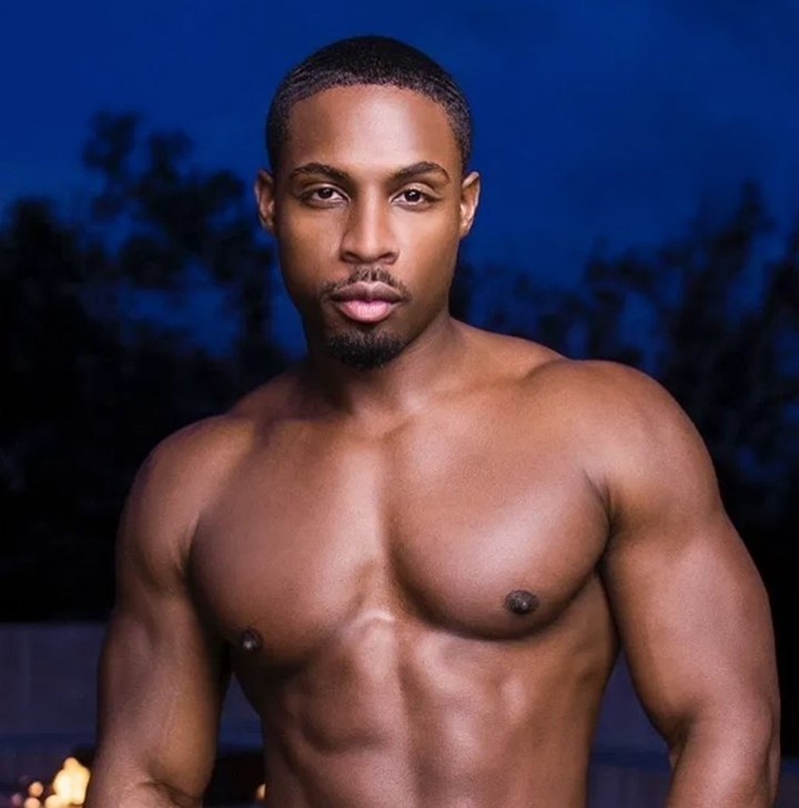 Hunky adult actor DeAngelo Jackson won the 2021 GayVN Performer of the Year. Now he is "about to expand his list of credits with his official mainstream acting debut," writes The Sword. "Starting last week, fans were able to see DeAngelo show off his acting chops on Here TV's short-form series 'Collar Confessions.'" "Inspired by the book 'Collar Confessions: Sharing the Man of God' by Dwight O'Neal, the series — part-soap, part-thriller — stars Nathaniel J. Ryan as Pastor Eddie, a preacher harboring secrets and attempting to make a fresh start with his husband Quentin, portrayed by Jackson," reports Metro Weekly. The couple faces an uphill battle, as Pastor Eddie's still trying to forgive Quentin for burning down his church in a jealous rage." O'Neal, who is co-writing the screenplay, discussed the series on the website Raynbow Affair. "This story deals with the hypocrisy within the church," says O'Neal.  "The church is a place that was created to heal; however, many people in the LGBTQ+ community enter the church and then are in need of healing.  They lead double lives, in constant fear of being discovered. Many turn to social media that is, in essence, a dangerous Pandora's Box where anything can happen." For his part, Jackson is thrilled to be part of the series. "It was the most fun I've ever had on a set," he told the LGBTQ publication, and is happy "to do something I've been wanting to do for a while now, which is to transition into acting. This was a perfect way of getting my feet wet." Tap link in bio to continue on @EDGEmedianetwork ???? (?: DeAngelo Jackson / @theonedeangelo)