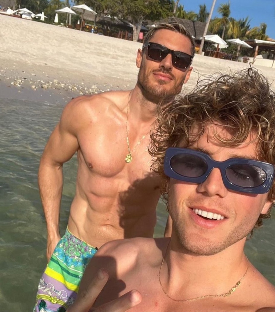 Actor Lukas Gage shared that he's in a relationship with another man, the Daily Mail reports. "Actor Lukas Gage and celeb hair stylist Chris Appleton are dating, as the pair were seen in a series of Instagram shots from a recent vacation they took to Punta de Mita, Mexico at the The St. Regis Punta Mita Resort." That the couple are officially dating was confirmed by the website Just Jared. "The 27-year-old 'You' and 'The White Lotu's actor and 39-year-old celebrity hairstylist for the likes of Kim Kardashian and Jennifer Lopez hopped on Instagram on Monday (February 20) to post pictures of themselves vacationing together and making it Instagram official,"writes Just Jared. "Both Lukas and Chris shared pictures themselves riding a four-wheeler while vacationing in Mexico. Lukas posted a couple more selfies they took while driving around wearing protective goggles and bandanas. He tagged The St. Regis Punta Mita hotel and captioned the post 'la mejor,' which translates to 'the best' in Spanish. Appleton has worked with notable names such as Jennifer Lopez, Kim Kardashian and Ariana Grande, with his work appearing in publications such as Vogue, Harper's Bazaar and Vanity Fair.⁠
⁠
Tap link in bio for more on @EDGEmedianetwork ⁠
????⁠
?: @lukasgage + @chrisappleton1